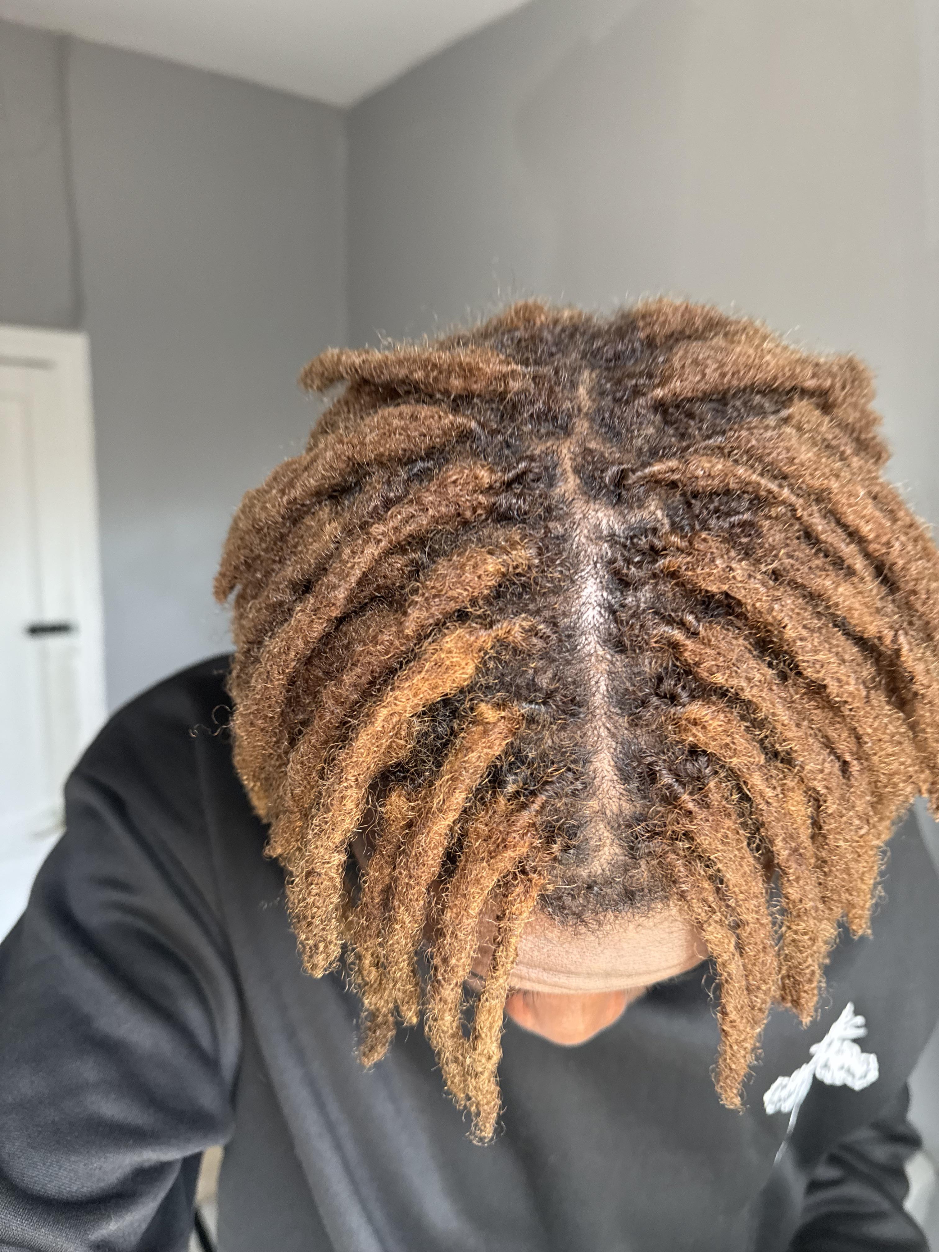 Locs retwisting at Bilama Salon
